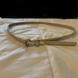 Skinny metallic man made belt